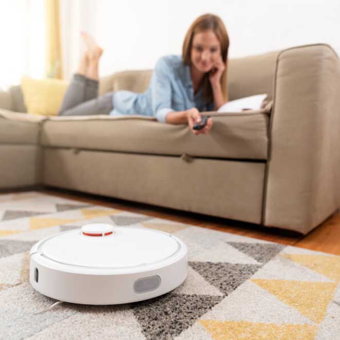 Robotic vacuum cleaner cleaning the room
