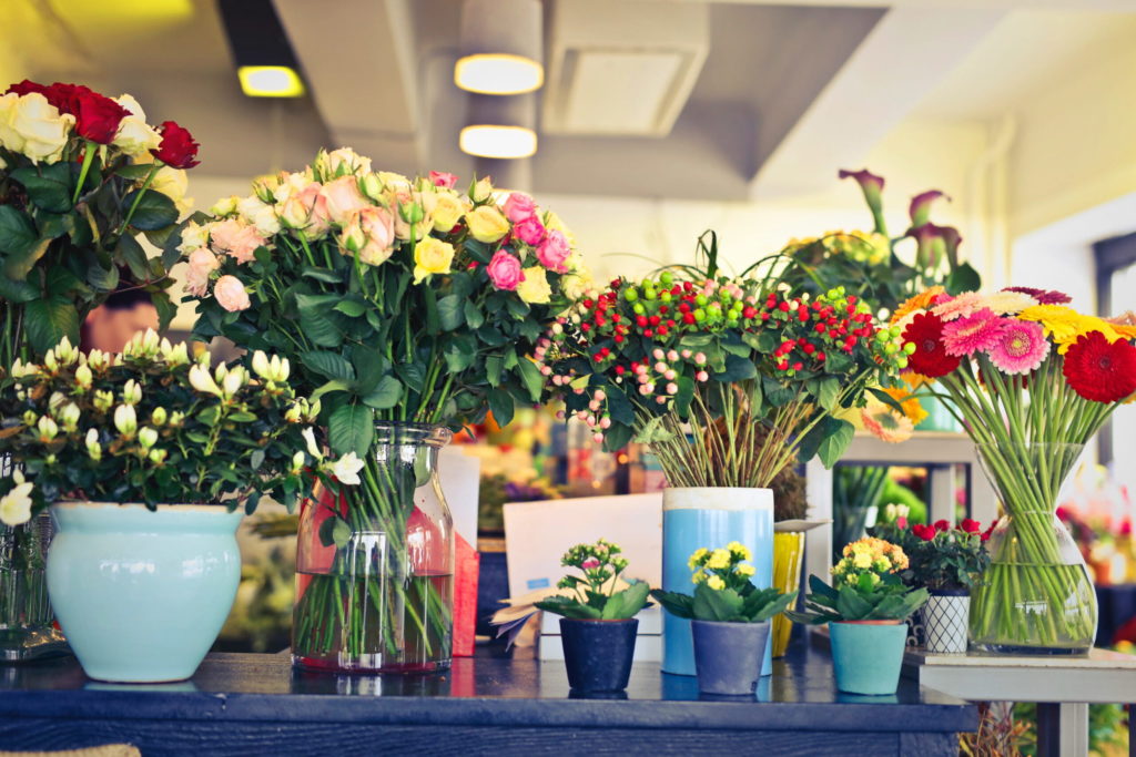 A flower shop display section with variety of flowers